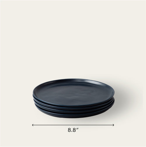 Salad plates dinnerware by Fable Home, shown in a midnightblue finish. – #midnightblue
