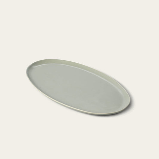 Oval serving platter dinnerware by Fable Home, shown in a beachgrassgreen finish. – #beachgrassgreen