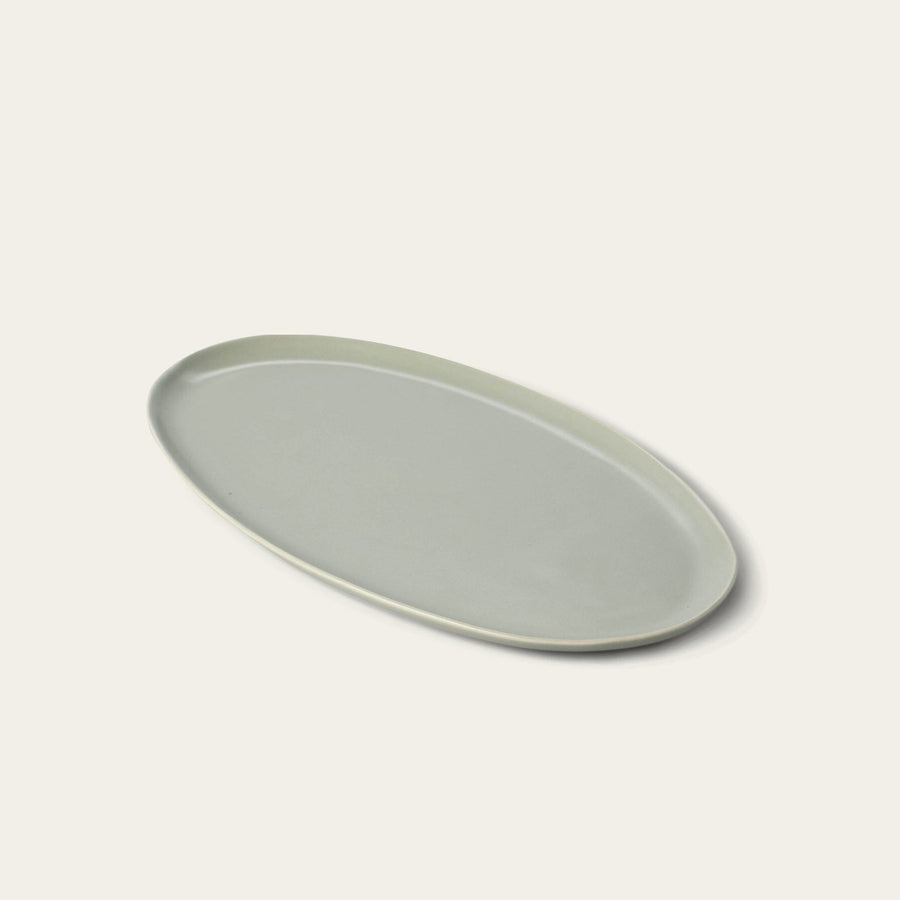 Oval serving platter dinnerware by Fable Home, shown in a beachgrassgreen finish. – #beachgrassgreen