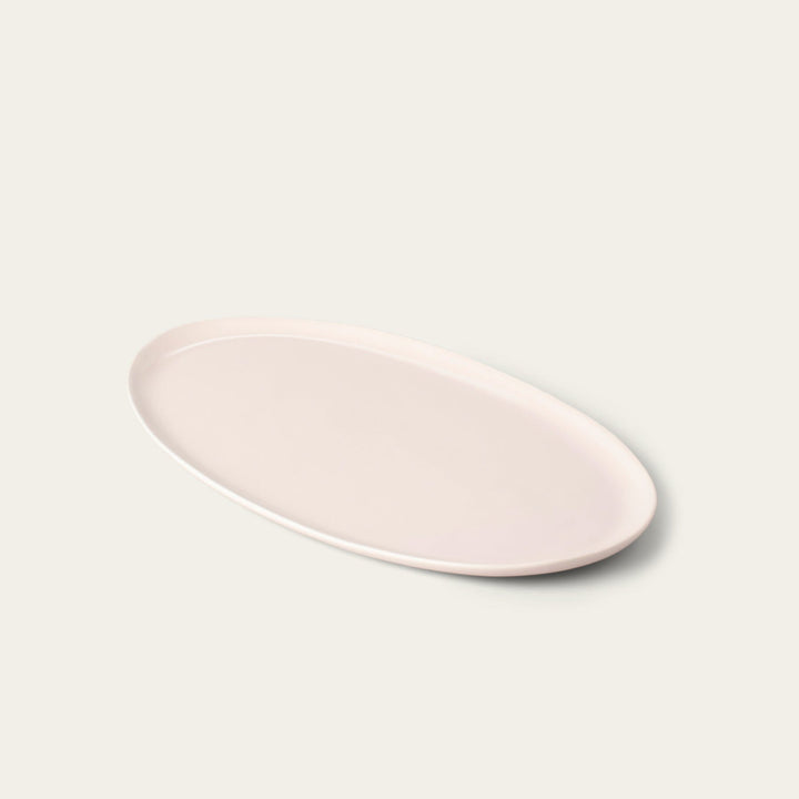 Oval serving platter dinnerware by Fable Home, shown in a blushpink finish. – #blushpink