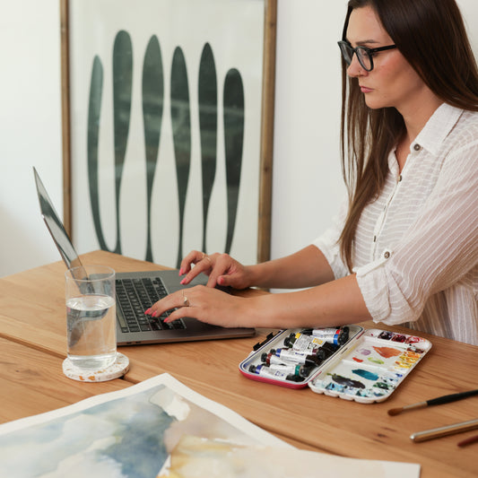 Artist and graphic designer Kristine Nilan is working