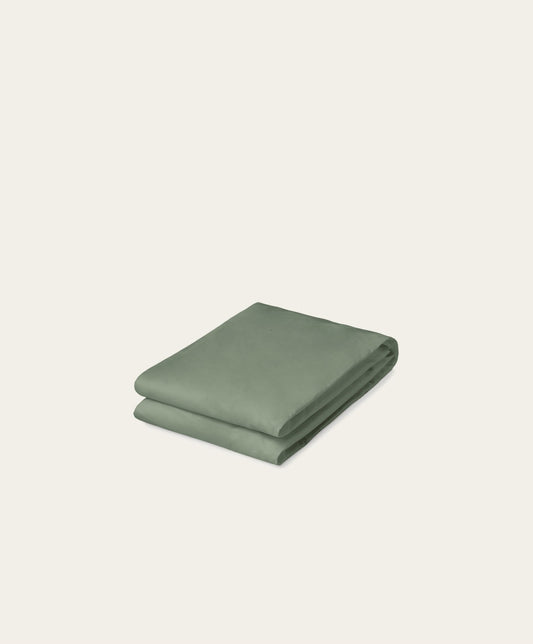 Percale Fitted Sheet by Fable Home, shown in Juniper Green. – #junipergreen/full #junipergreen/queen #junipergreen/king