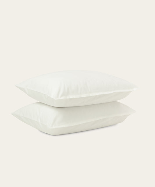 Percale Pillowcase Pair by Fable Home, shown in Shell White. – #shellwhite/standard #shellwhite/king