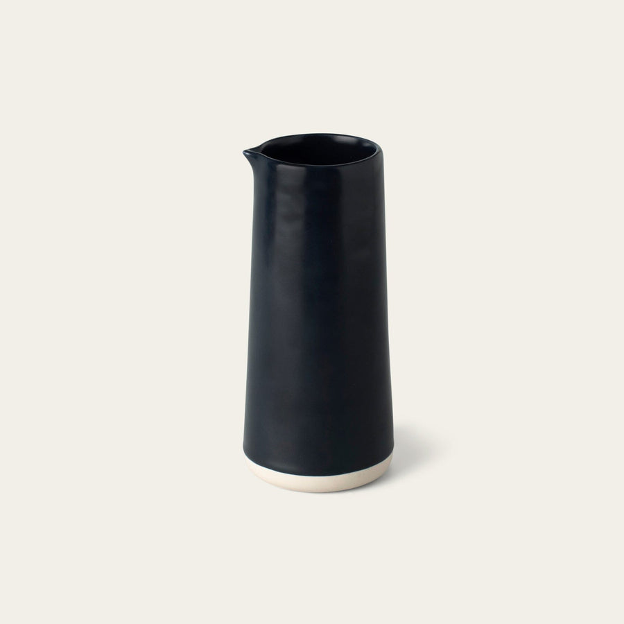 Carafe drinkware by Fable Home, shown in a midnightblue finish. – #midnightblue