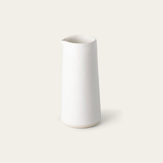 Carafe drinkware by Fable Home, shown in a speckledwhite finish. – #speckledwhite
