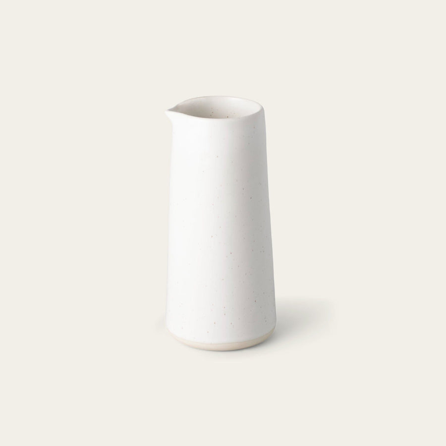 Carafe drinkware by Fable Home, shown in a speckledwhite finish. – #speckledwhite