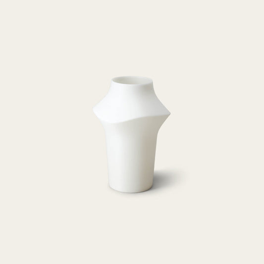 Curve table light lighting by Fable Home, shown in a translucent finish. – #translucent
