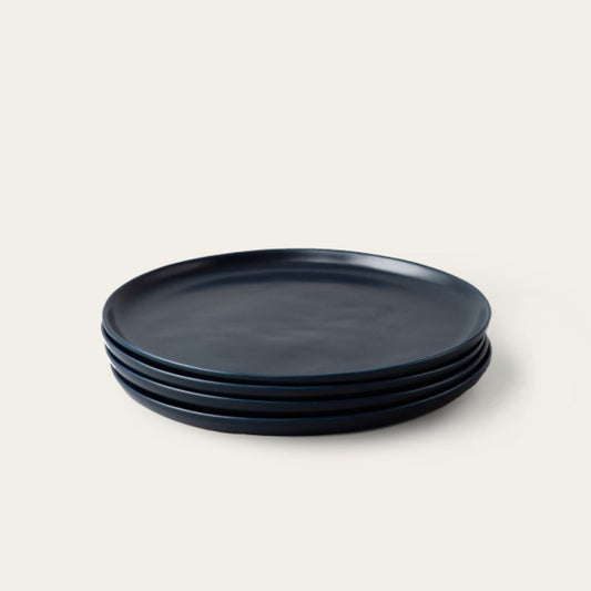 Dinner plates dinnerware by Fable Home, shown in a midnightblue finish. – #midnightblue