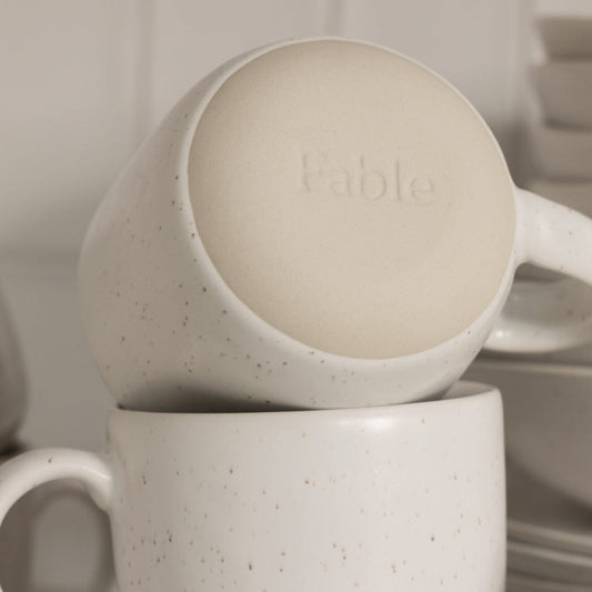 Mugs dinnerware by Fable Home, shown in a speckledwhite finish. – #speckledwhite