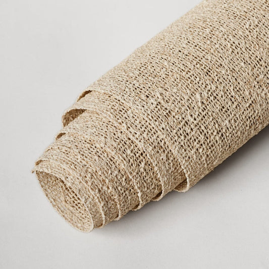 Rolled up rug pad. #natural