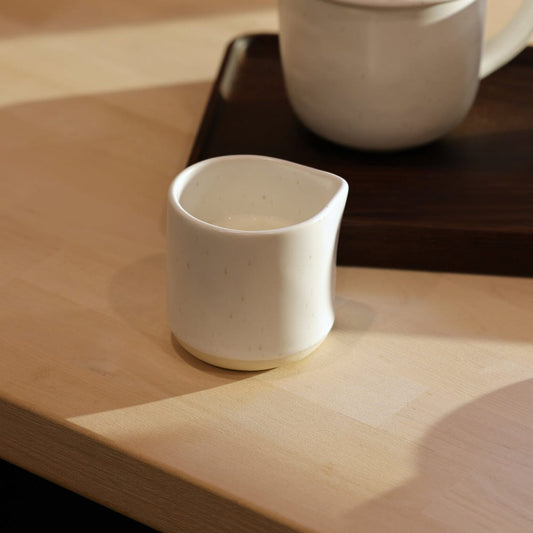 Small carafe drinkware by Fable Home, shown in a speckledwhite finish. – #speckledwhite