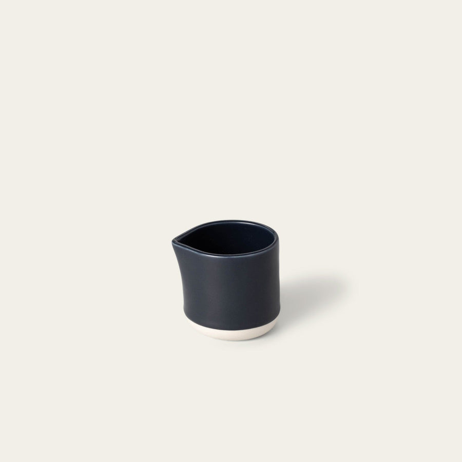 Small carafe drinkware by Fable Home, shown in a midnightblue finish. – #midnightblue