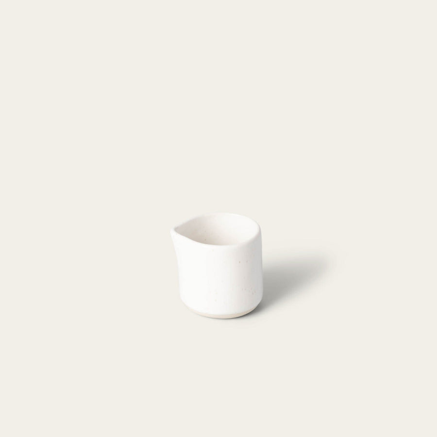 Small carafe drinkware by Fable Home, shown in a speckledwhite finish. – #speckledwhite