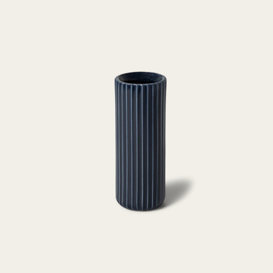 Tall bud vase decor by Fable Home, shown in a midnightblue finish. – #midnightblue