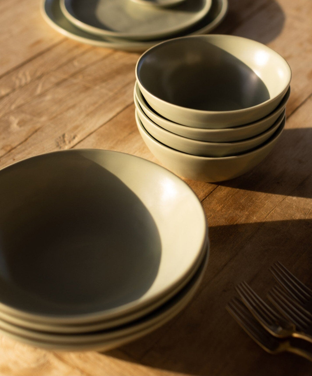 Complete Dinnerware Set by Fable Home, shown in Beachgrass Green.