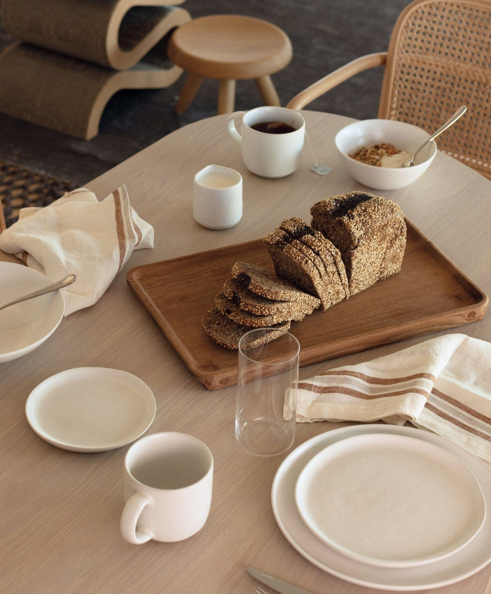 Complete Dinnerware Set by Fable Home, shown in Speckled White.