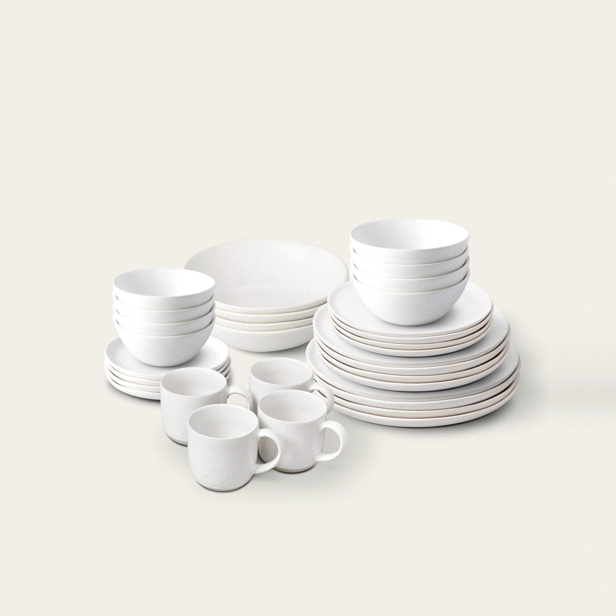 Complete Dinnerware Set by Fable Home, shown in Speckled White.