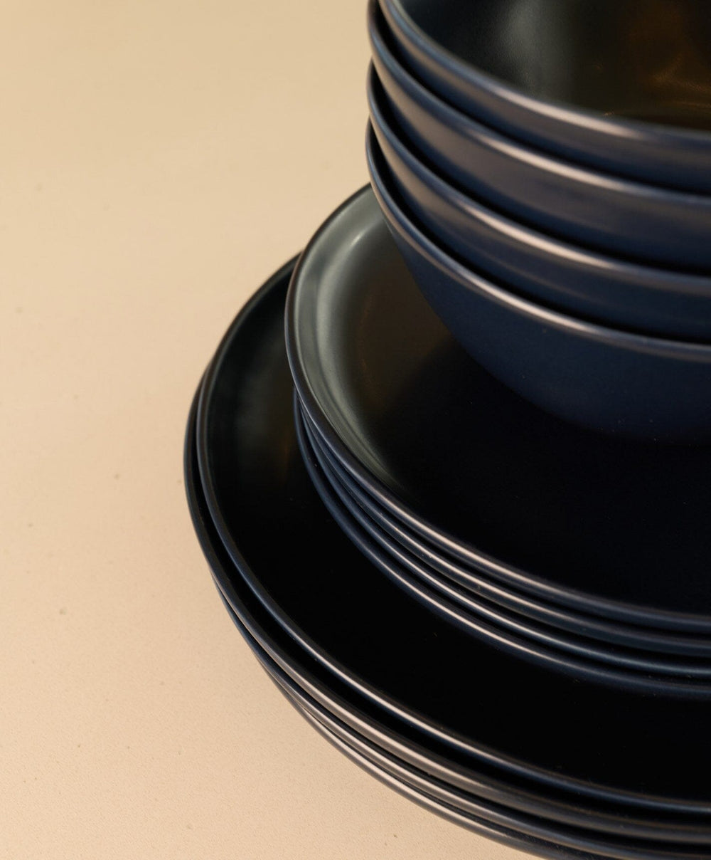 Everyday Dinnerware Set by Fable Home, shown in Midnight Blue.
