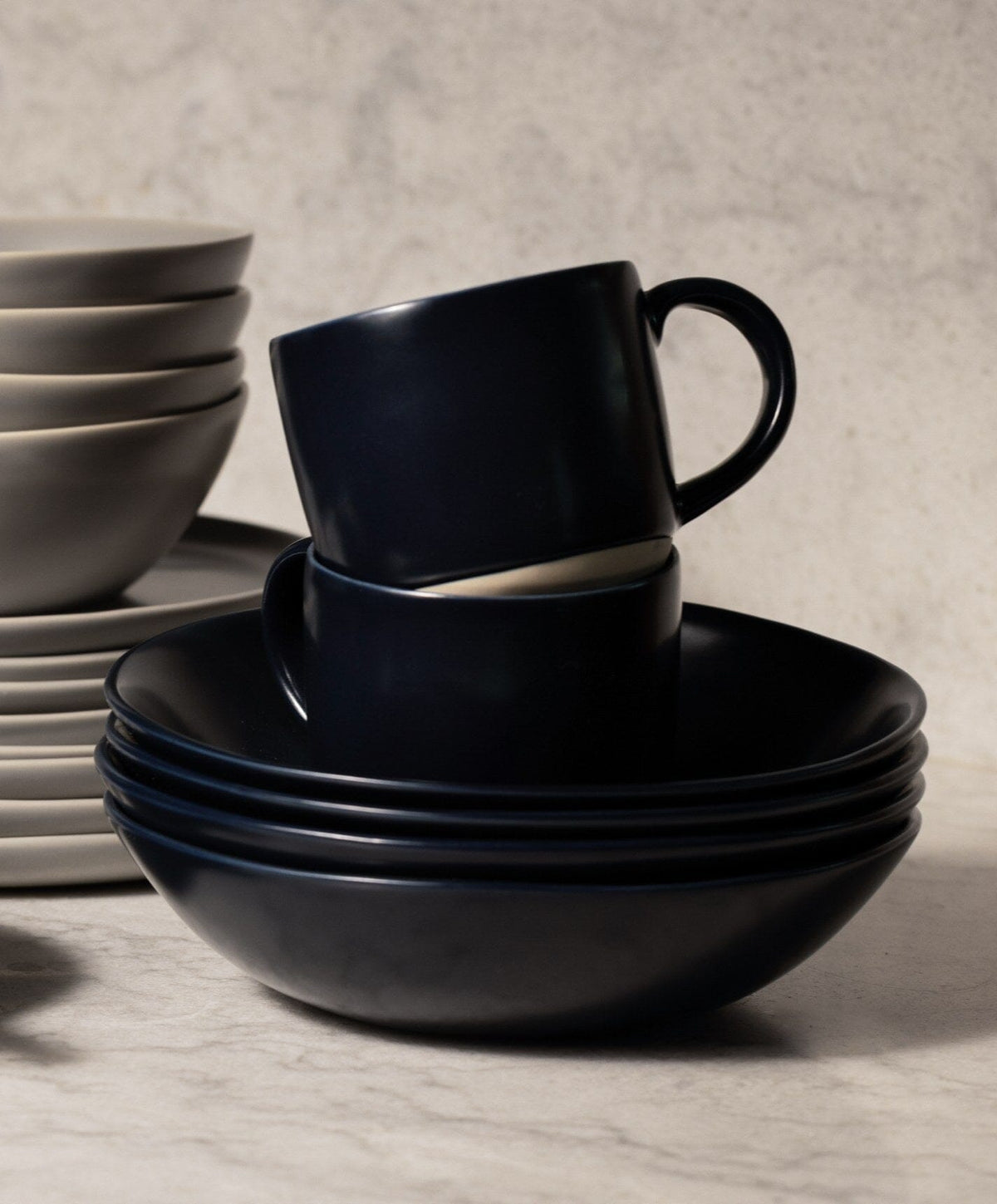 Everyday Dinnerware Set by Fable Home, shown in Midnight Blue.