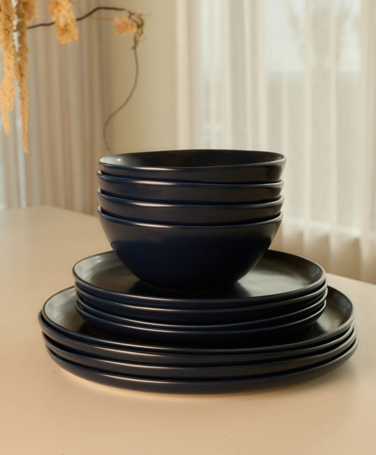 Everyday Dinnerware Set by Fable Home, shown in Midnight Blue.