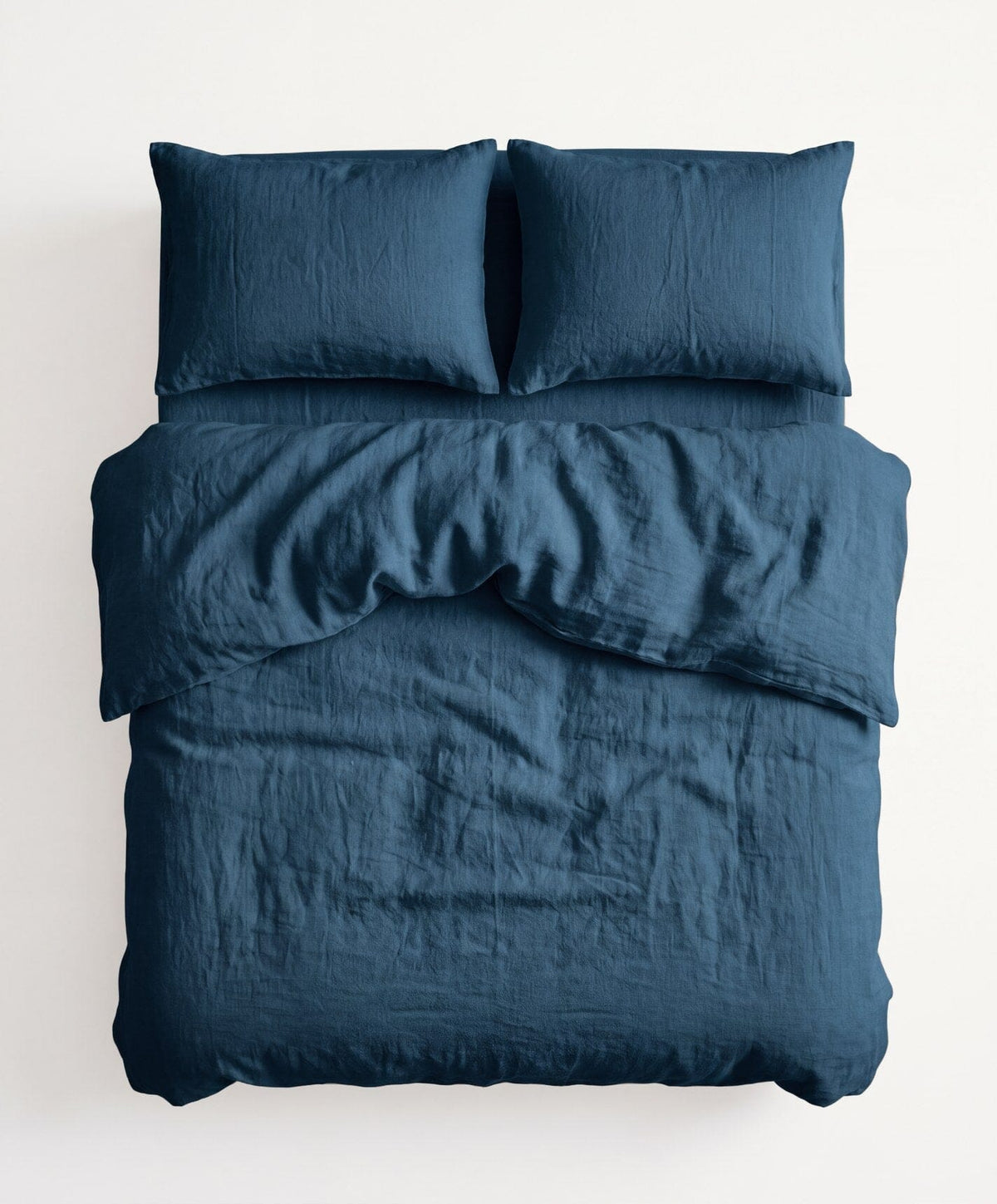 Linen Complete Bed Set by Fable Home, shown in Storm Blue.