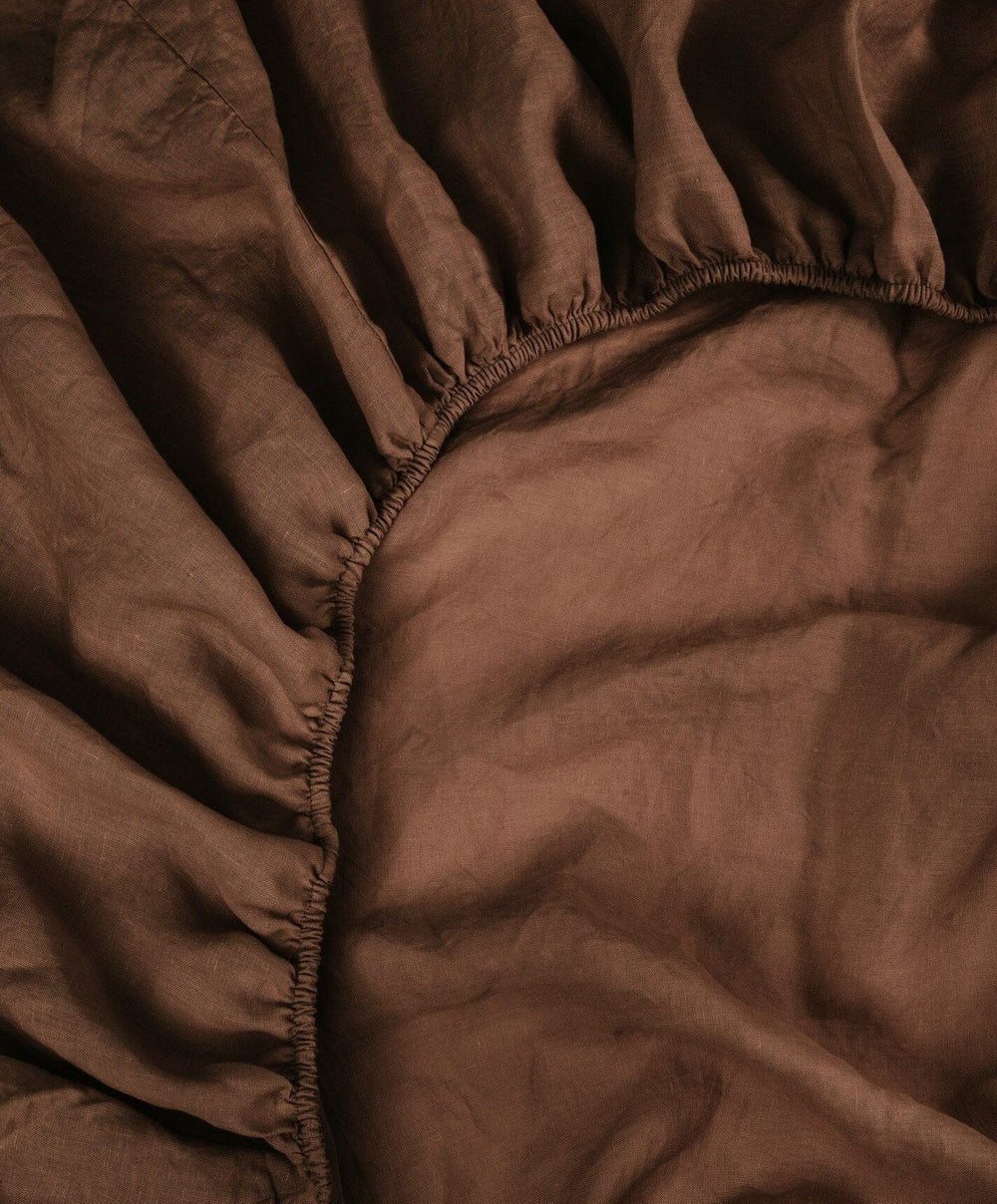 Linen Fitted Sheet by Fable Home, shown in Walnut Brown.