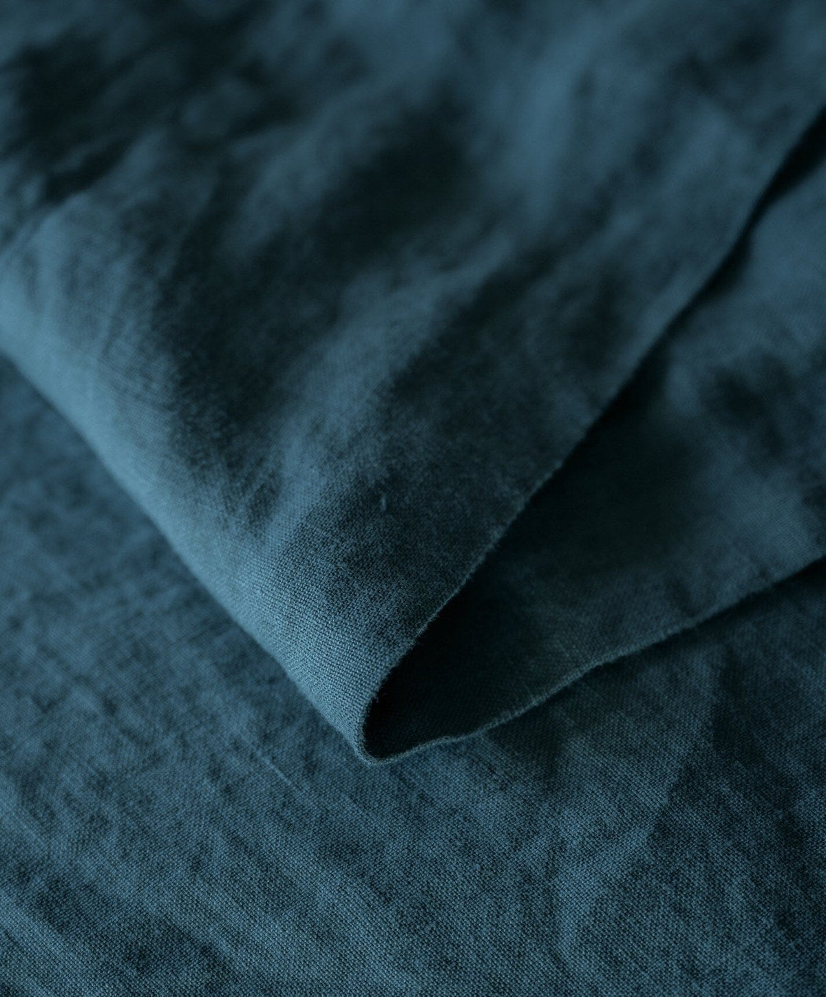 Linen Flat Sheet by Fable Home, shown in Storm Blue.