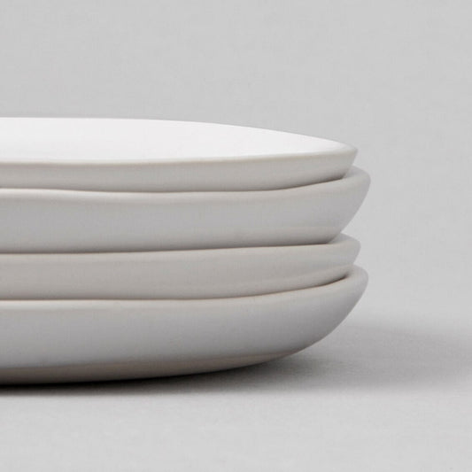 Lunch plates dinnerware by Fable Home, shown in a cloudwhite finish, sidy view. – #cloudwhite