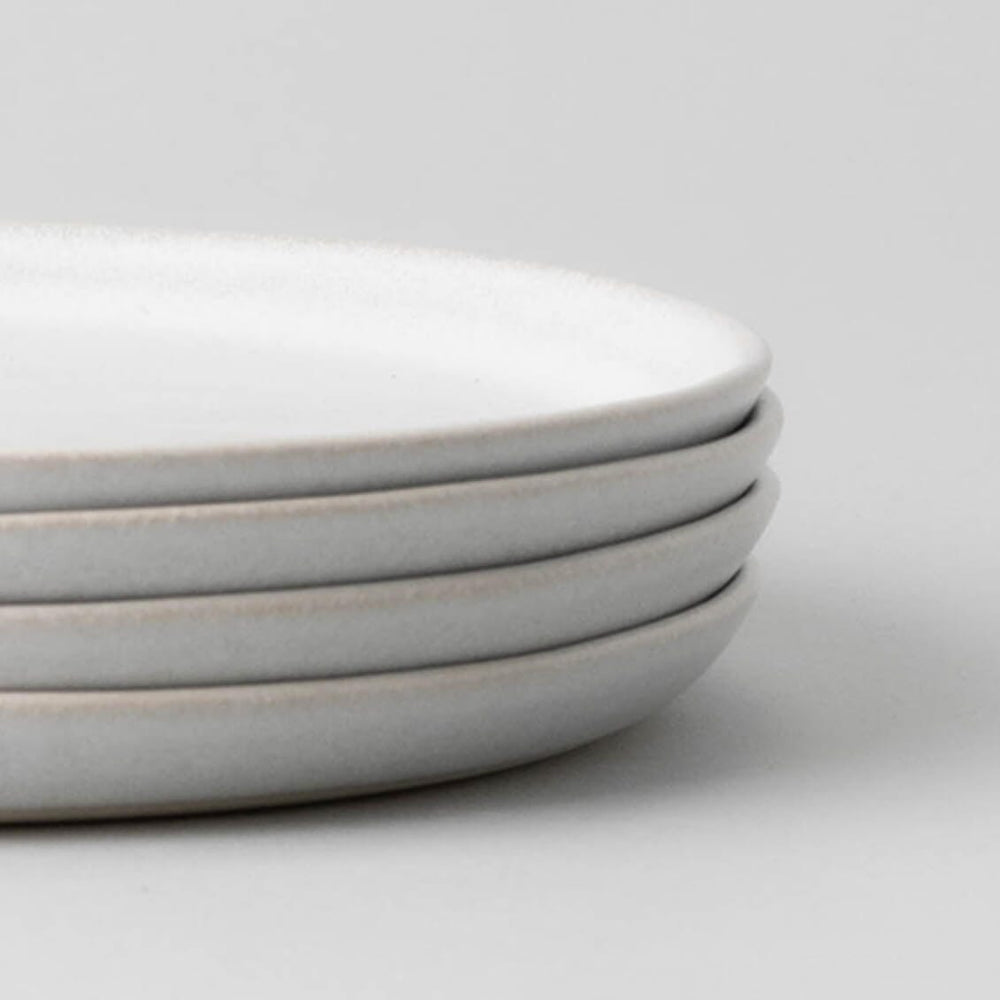 Salad plates dinnerware by Fable Home, shown in a stoneblue finish, .