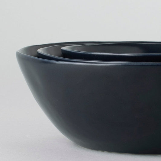 Nested serving bowls dinnerware by Fable Home, shown in a midnightblue finish. – #midnightblue