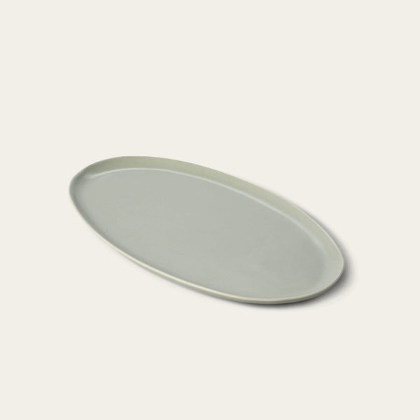 Oval serving platter dinnerware by Fable Home, shown in a beachgrassgreen finish. – #beachgrassgreen