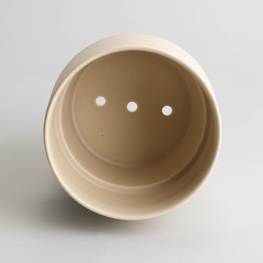 Planter planters by Fable Home, shown in a large/coastalcream finish.