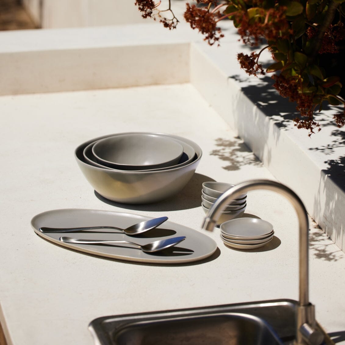 Serving ceramics set bundles by Fable Home, shown in a blushpink finish.