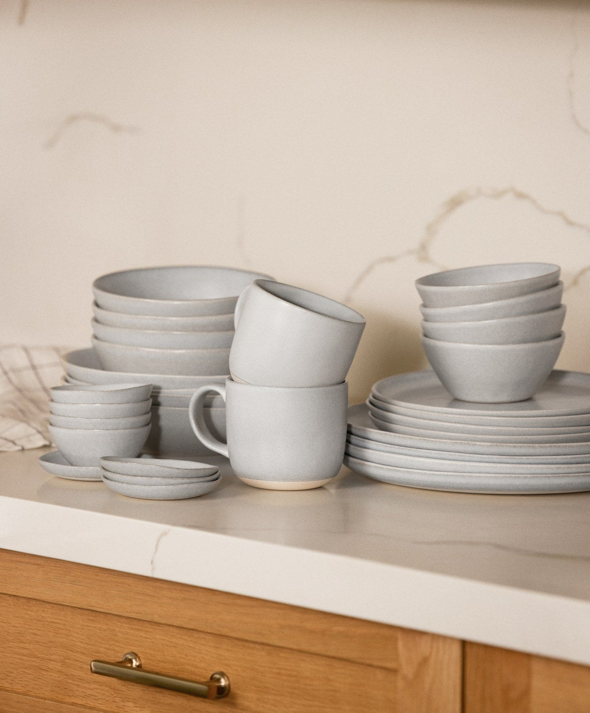 Dinnerware Set by Fable Home, shown in Stone Blue.