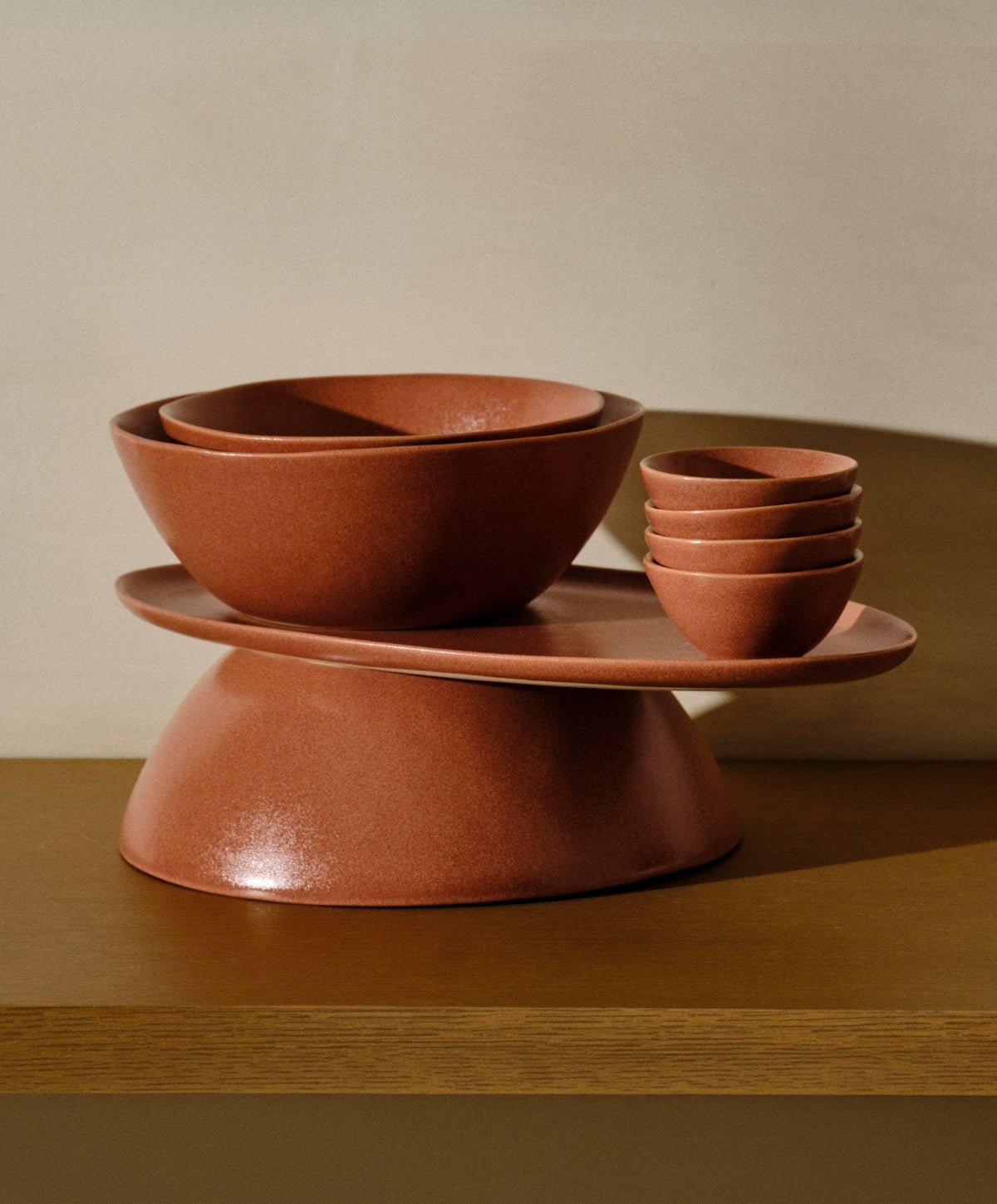 Serving Ceramics Set by Fable Home, shown in Canyon Clay.