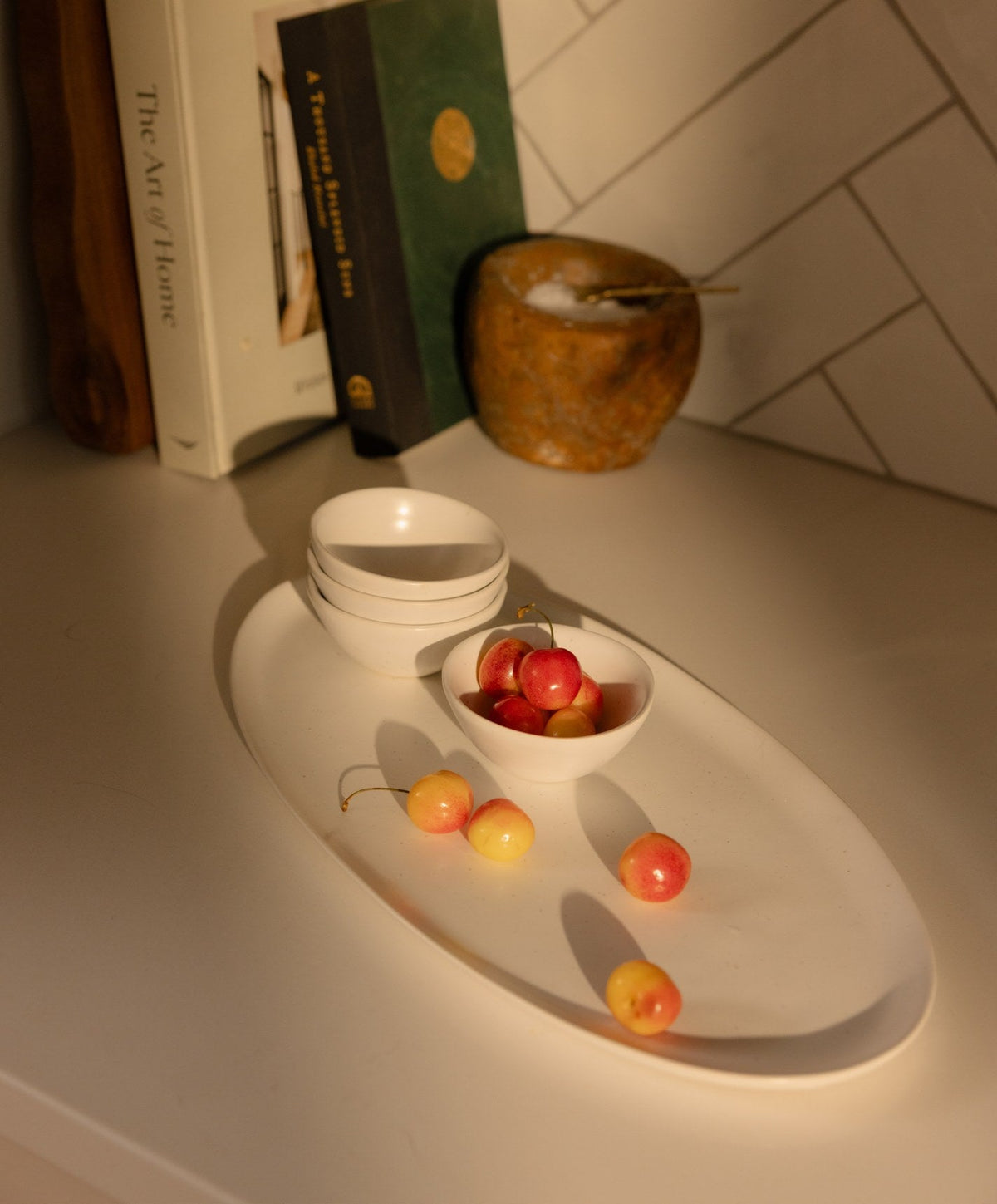 Serving Ceramics Set by Fable Home, shown in Speckled White.