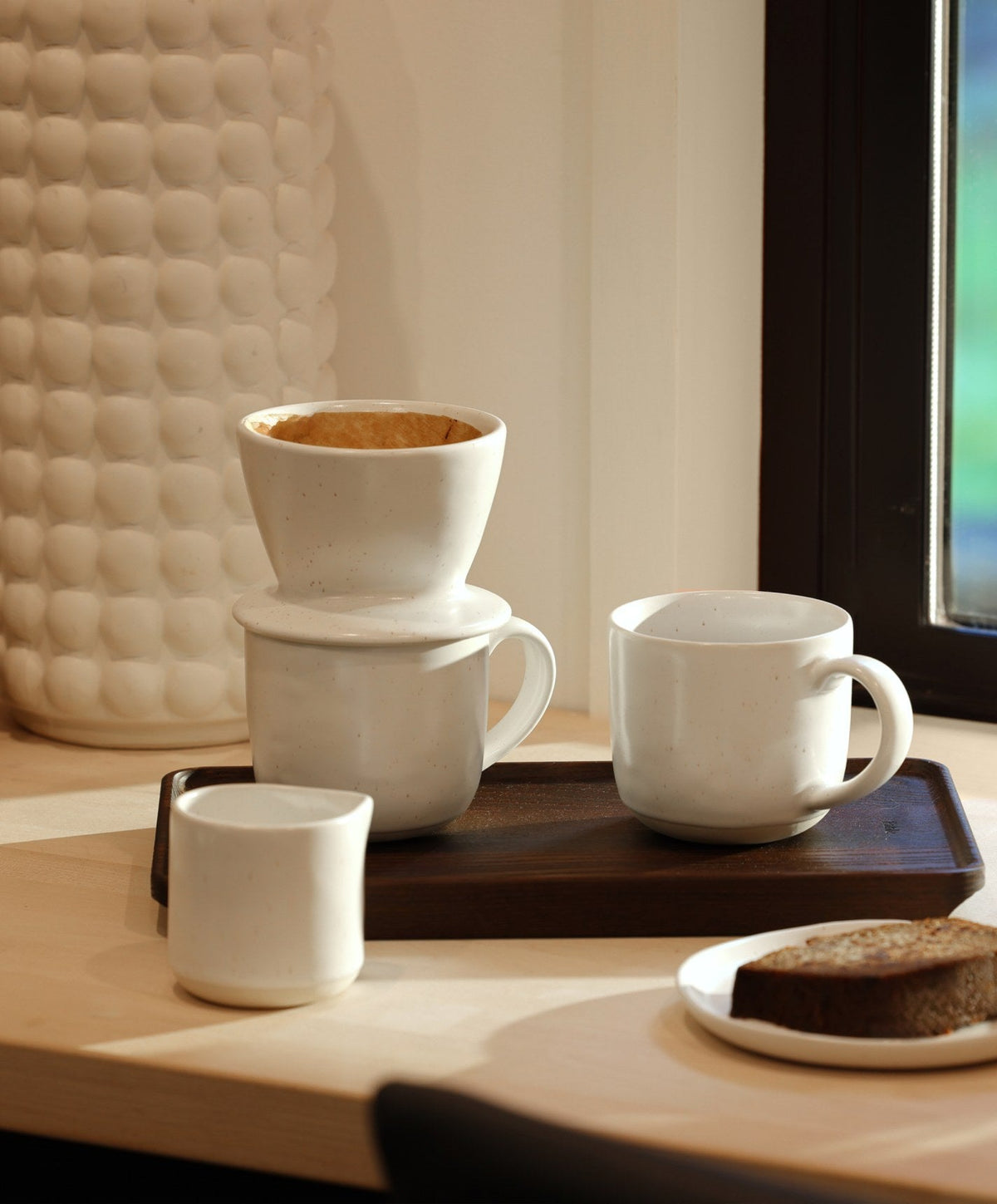 Coffee Dripper by Fable Home, shown in Speckled White.