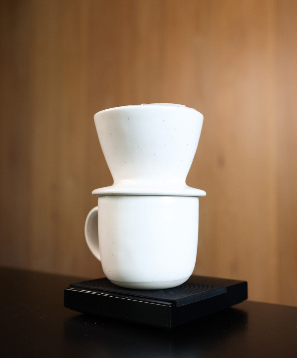 Coffee Dripper by Fable Home, shown in Speckled White and Dove Gray and Desert Taupe.