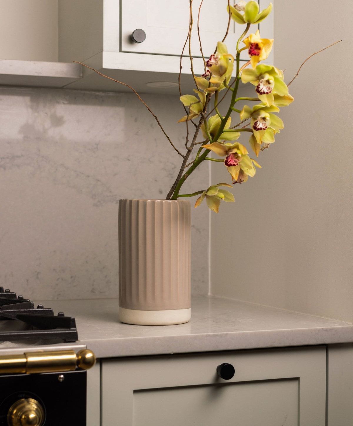 Vase by Fable Home, shown in Desert Taupe and Midnight Blue.