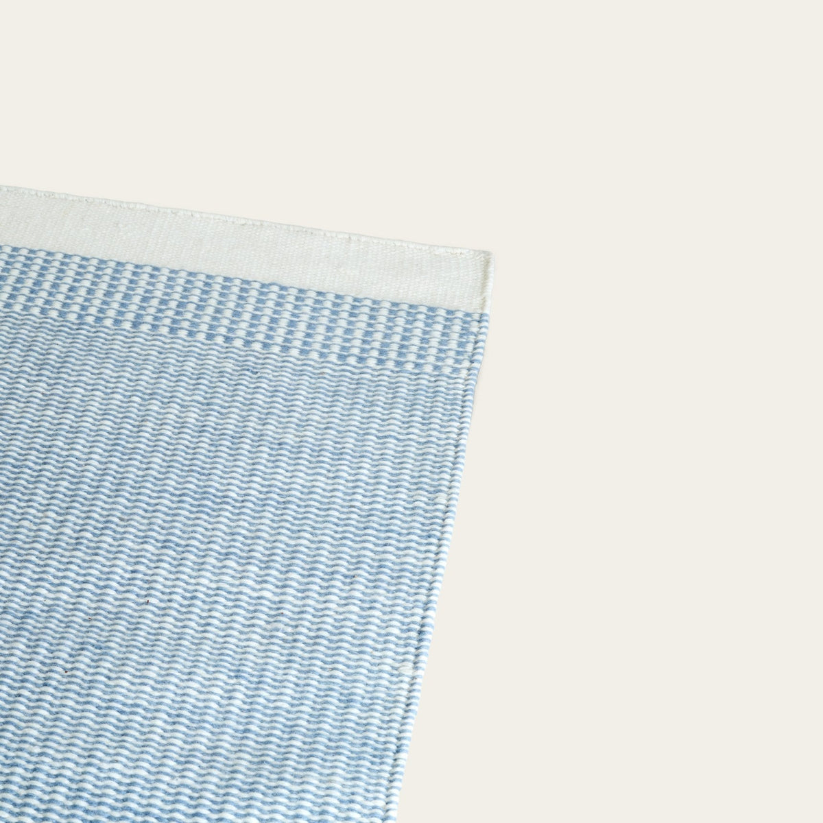 Linear Wool Rug by Fable Home, shown in Dusk Blue.
