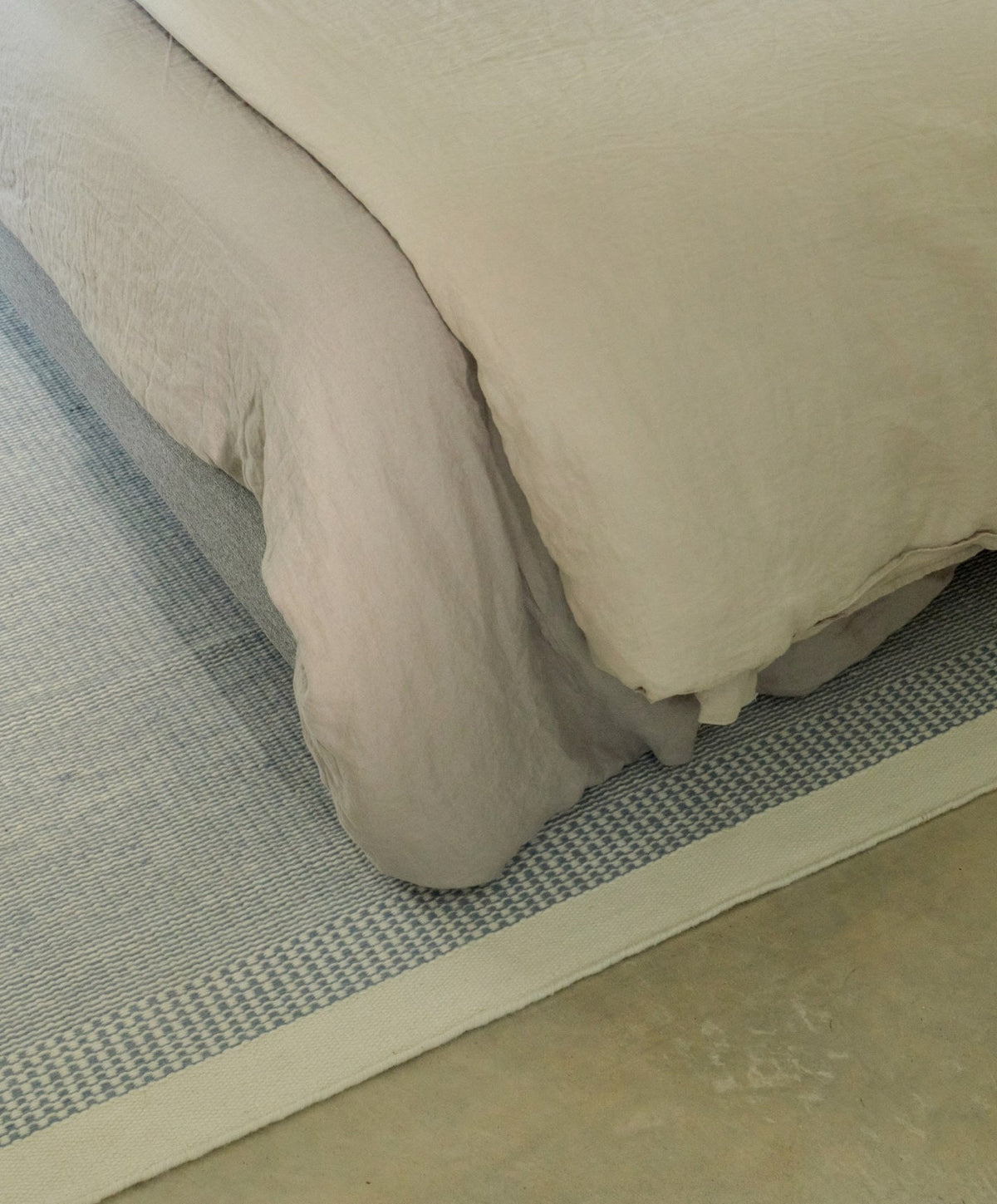 Linear Wool Rug by Fable Home, shown in Dusk Blue.