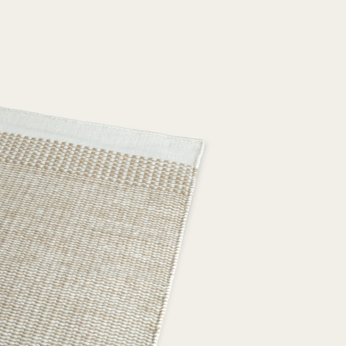 Linear Wool Rug by Fable Home, shown in Coastal Cream.