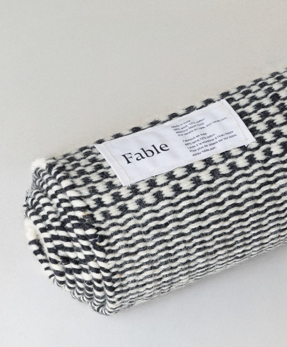 Linear Wool Rug by Fable Home, shown in Ash Black.
