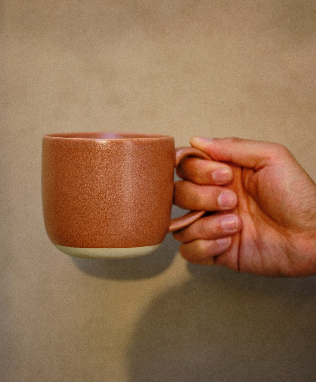 Mugs by Fable Home, shown in Canyon Clay.