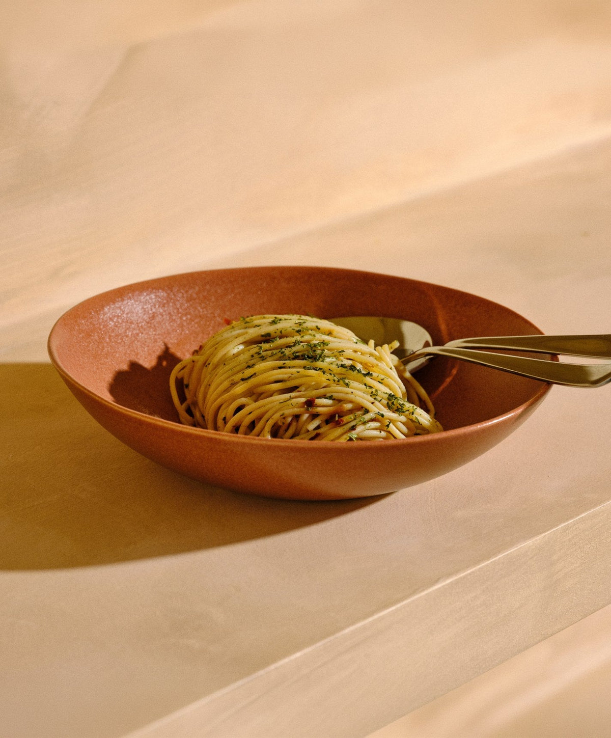 Pasta Bowls by Fable Home, shown in Canyon Clay.