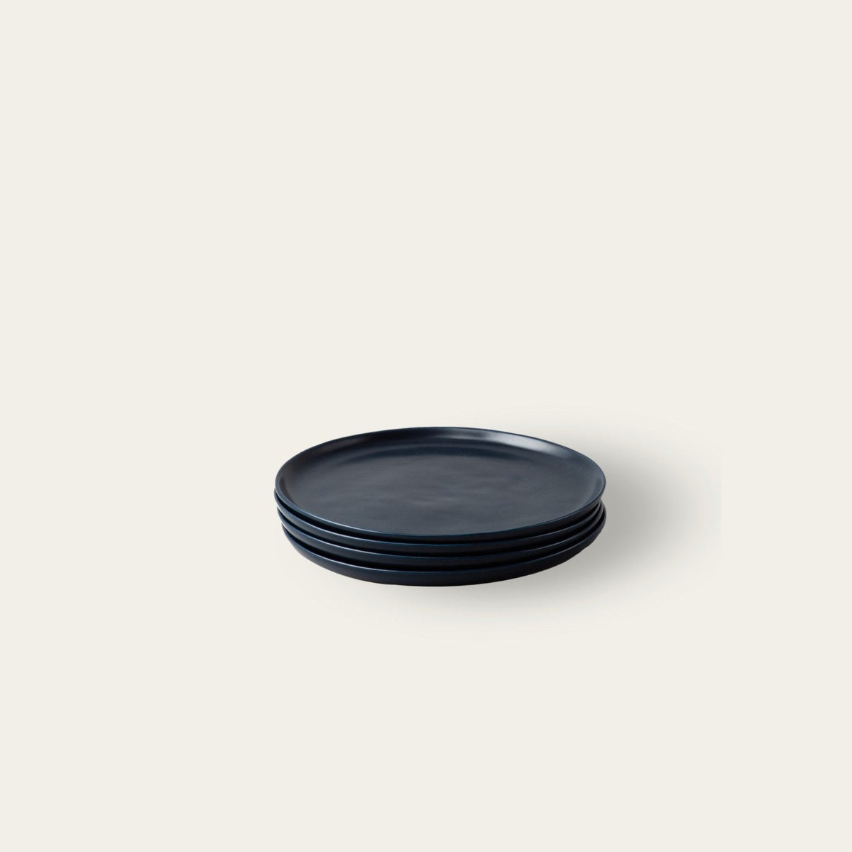Salad Plates by Fable Home, shown in Midnight Blue.