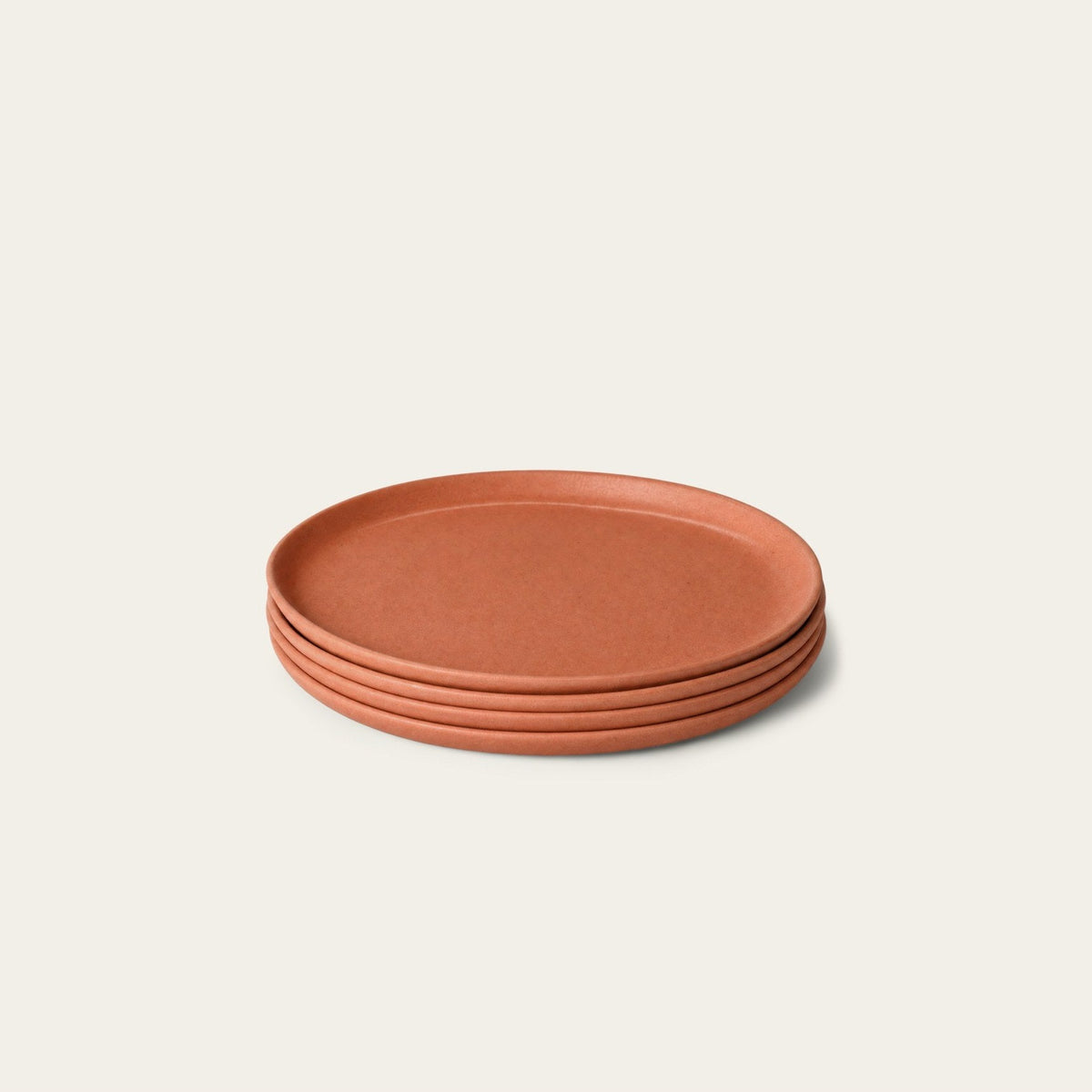 Dinner Plates by Fable Home, shown in Canyon Clay.