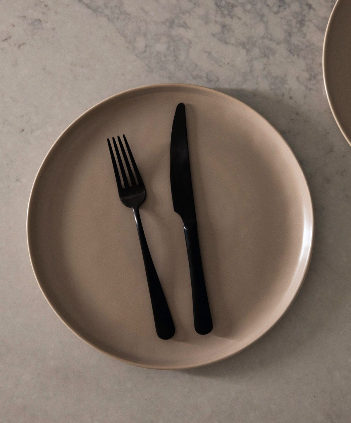 Dinner Plates by Fable Home, shown in Desert Taupe.