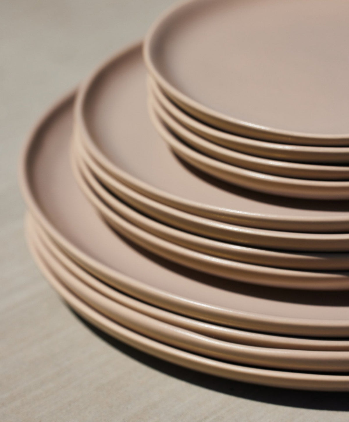 Dinner Plates by Fable Home, shown in Desert Taupe.