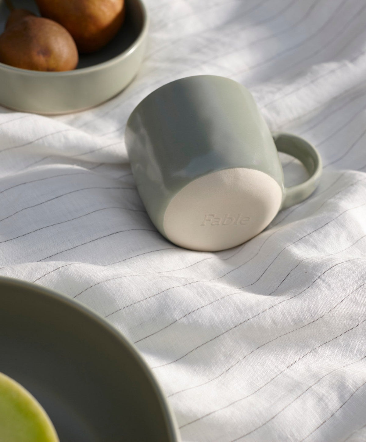 Mugs by Fable Home, shown in Beachgrass Green.